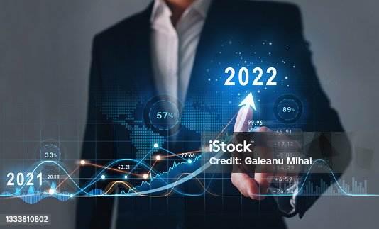 istock Businessman draws  increase arrow graph corporate future growth year 2021 to 2022.   Development to success and motivation. 1333810802