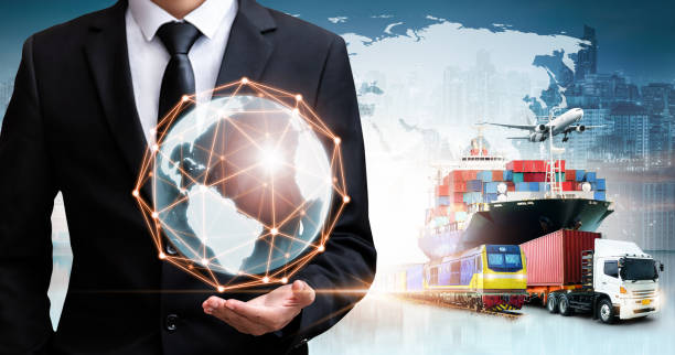 Businessman holding digital globe in palm for logistics import export background and container cargo freight ship transport concept Businessman holding digital globe in palm for logistics import export background and container cargo freight ship transport concept chain store stock pictures, royalty-free photos & images