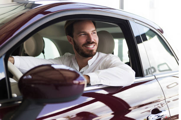 Businessman in car Businessman in car  driving man driving suit stock pictures, royalty-free photos & images