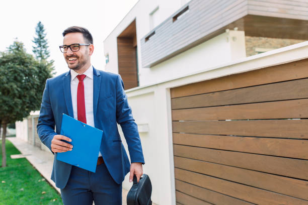 Businessman Smiling modern young businessman going to work real estate agent stock pictures, royalty-free photos & images