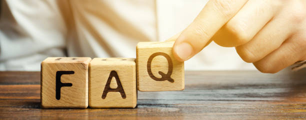 Businessman puts wooden blocks with the word FAQ (frequently asked questions). Collection of frequently asked questions on any topic and answers to them. Instructions and rules on Internet sites Businessman puts wooden blocks with the word FAQ (frequently asked questions). Collection of frequently asked questions on any topic and answers to them. Instructions and rules on Internet sites q and a photos stock pictures, royalty-free photos & images