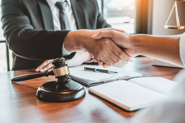 7,252 Lawyer Handshake Stock Photos, Pictures &amp; Royalty-Free Images - iStock