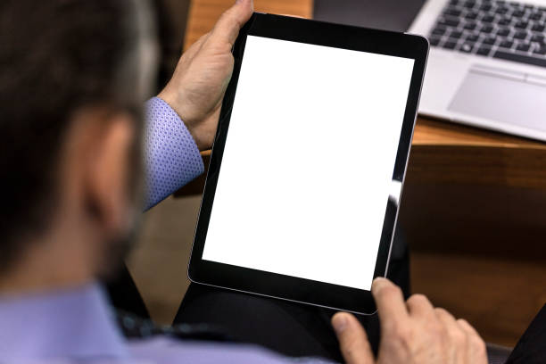 Businessman using digital tablet with blank screen stock photo