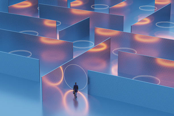 Businessman walking into mysterious maze stock photo