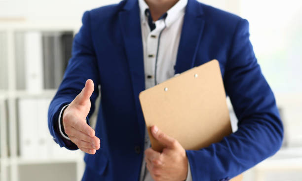 Businessman willing to shake hand, confirm deal, support decision, finish discussion Close-up of businessman willing to shake hand, confirm deal, support decision, finish discussion. Friendly gesture towards client. Deal, agree concept Willing stock pictures, royalty-free photos & images