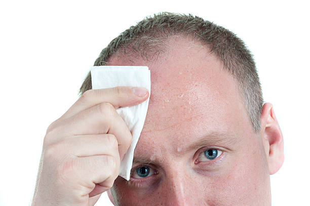 Royalty Free Wiping Sweat Pictures, Images and Stock Photos - iStock