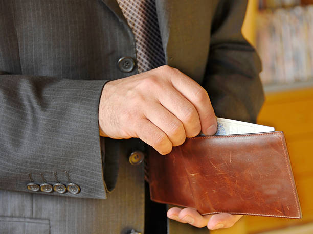 Businessman with wallet stock photo