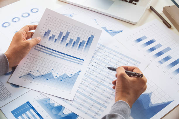 businessman working data document graph chart report marketing research development  planning management strategy analysis financial accounting. Business  office concept. stock photo
