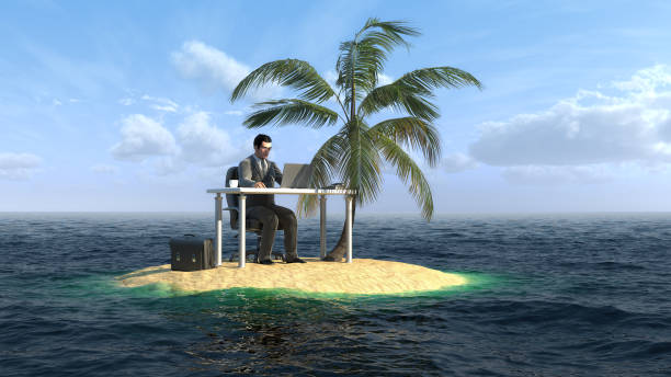 Businessman working on the small island stock photo