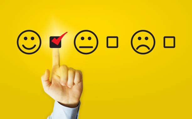 Businessmen choose to rating score happy icons. Customer service experience and business satisfaction survey concept stock photo