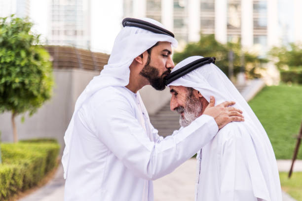 Businessmen handshaking after a successful business deal  middle eastern culture stock pictures, royalty-free photos & images