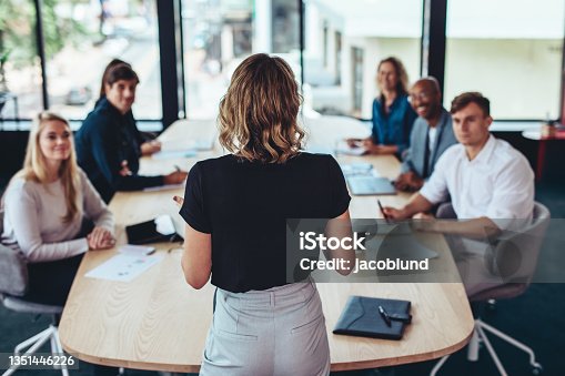 istock Businesswoman addressing a meeting in office 1351446226