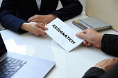 istock businesswoman hand sending a resignation letter to executive boss. letter of resignation, Quitting a job, The big quit.The great Resignation.Resignation concept. 1346882936