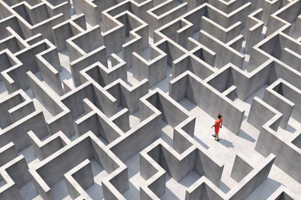 Businesswoman in a full frame complex maze A businesswoman walks in a full frame complex maze and looks for the way out, Digitally Generated Image. maze photos stock pictures, royalty-free photos & images