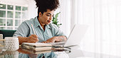 istock Businesswoman looking busy working from home 1335930216