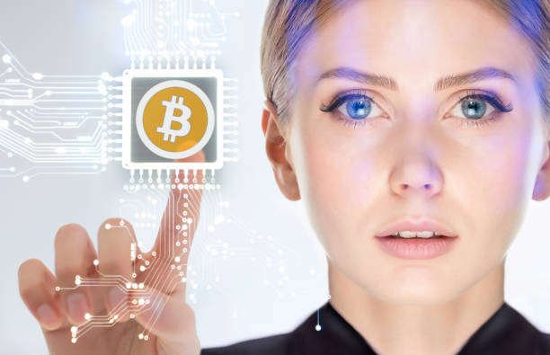Businesswoman touching cryptocurrency Bitcoin circuit on virtual screen stock photo