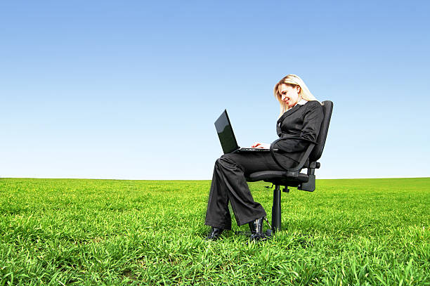 Businesswoman with a laptop stock photo