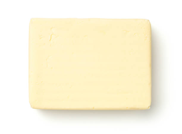 boter geïsoleerd op witte achtergrond - boter stockfoto's en -beelden
