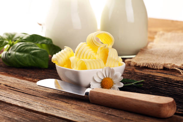 butter swirls. margarine or spread, fatty natural dairy product. High-calorie food for cooking and eating stock photo