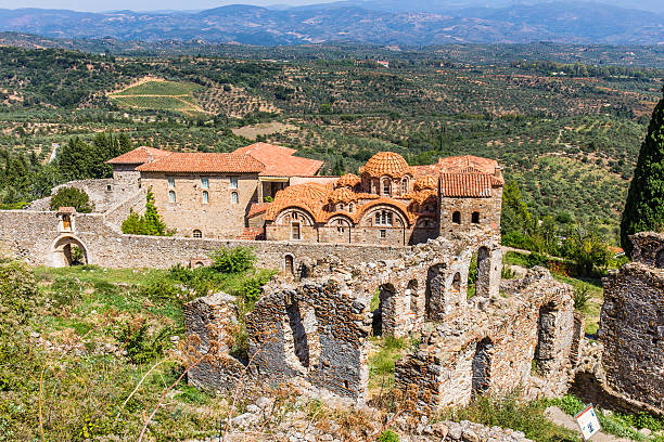 Byzantine church in medieval city of Mystras Byzantine church in medieval city of Mystras, Peloponnes, Laconia, Greece peloponnese stock pictures, royalty-free photos & images