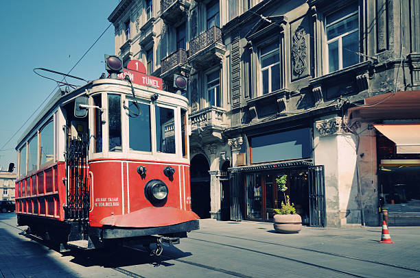 cable car in street of istiklal, beyoglu, istanbul, turkey - beyoglu stockfoto's en -beelden