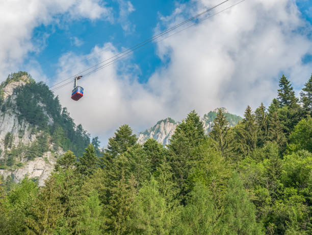 Cable car or telecabin in the Carpathian Mountains, Romania. Beautiful landscape in Bucegi National Park, Romania. Cable car or telecabin in the Carpathian Mountains, Romania. Beautiful landscape in Bucegi National Park, Romania. bucegi mountains stock pictures, royalty-free photos & images