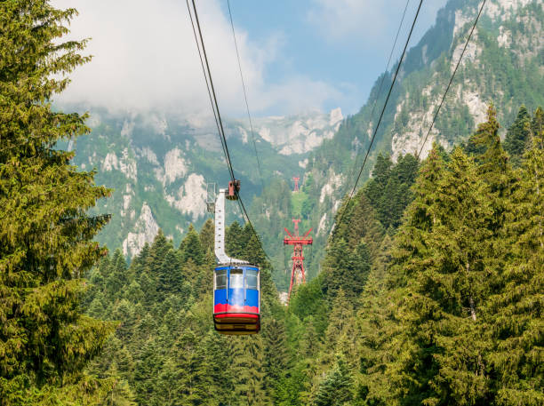 Cable car or telecabin in the Carpathian Mountains, Romania Cable car or telecabin in the Carpathian Mountains, Romania. bucegi mountains stock pictures, royalty-free photos & images