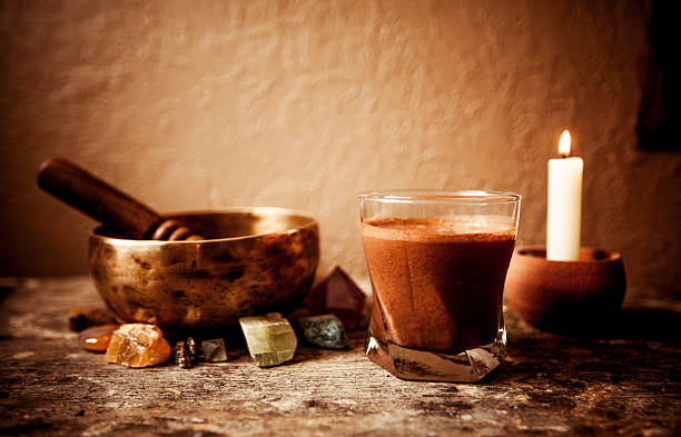 Cacao Beverage, Tibetan Singing Bowl and Gemstones stock photo