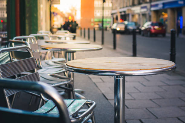 Cafe furniture on pavement stock photo