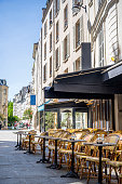 Paris attract crowds of tourists with charm of combining exquisite architecture with simple residential buildings filled with tiny boutiques bakeries street cafes that create unique French atmosphere