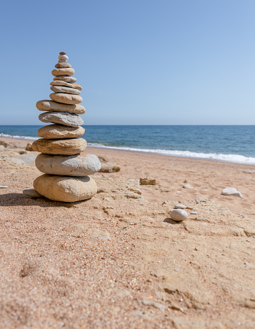 Cairn Stones on an empty beach