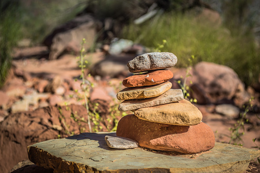 piles of stones (cairn) marking the trail on a desert hike in Utah