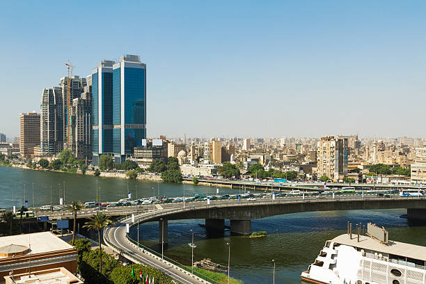 Cairo skyline along Nile River View of Cairo downtown area skyscrapers, along the Nile river from Gezira Island. cairo stock pictures, royalty-free photos & images