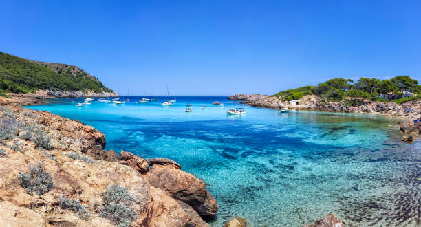 Cala Moltó a small bay in the north east of the Spanish Balearic island of Majorca / Spain Cala Moltó is a small bay in the north east of the Spanish Balearic island of Majorca. It is located near Cala Rajada in the municipality of Capdepera. majorca stock pictures, royalty-free photos & images