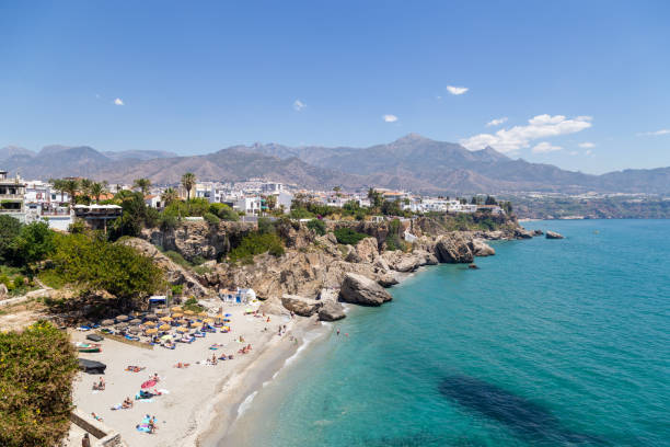 Calahonda Beach in Nerja, Spain Nerja, Spain - May 28, 2019: View of Mediterranean Sea and Calahonda Beach from viewpoint of Europe's Balcony. nerja stock pictures, royalty-free photos & images