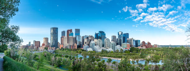 Calgary skyline Panoramic view of Calgary's skyline on a beautiful summer day. Calgary is Alberta's largest city. calgary stock pictures, royalty-free photos & images