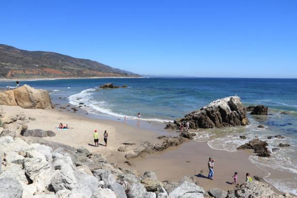 California State Beach People visit Leo Carillo State Beach near Malibu, California. California State Park system manages 280 properties including state beaches. Beaches to Visit in Southern California stock pictures, royalty-free photos & images