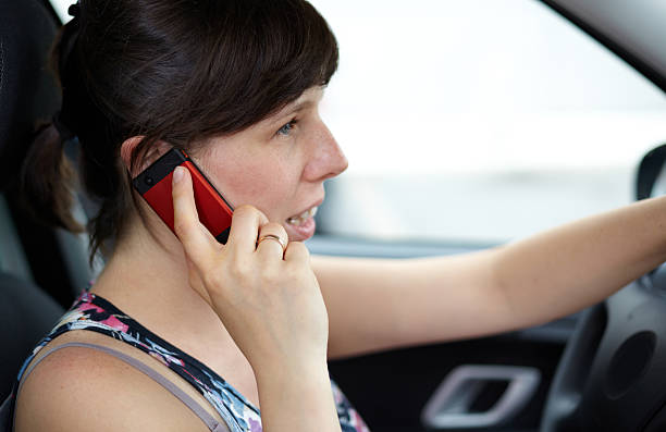 calling and driving stock photo