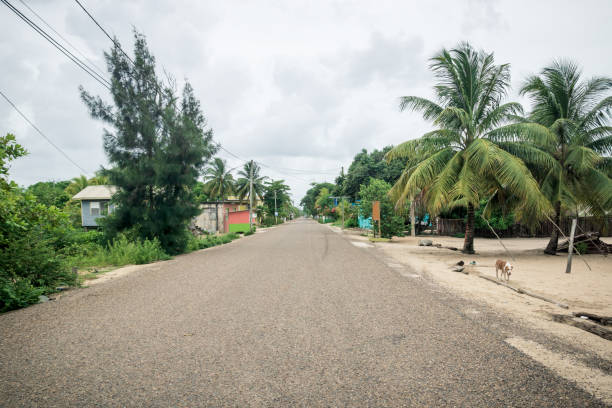 Calm main street through local village in Hopkins, Belize stock photo