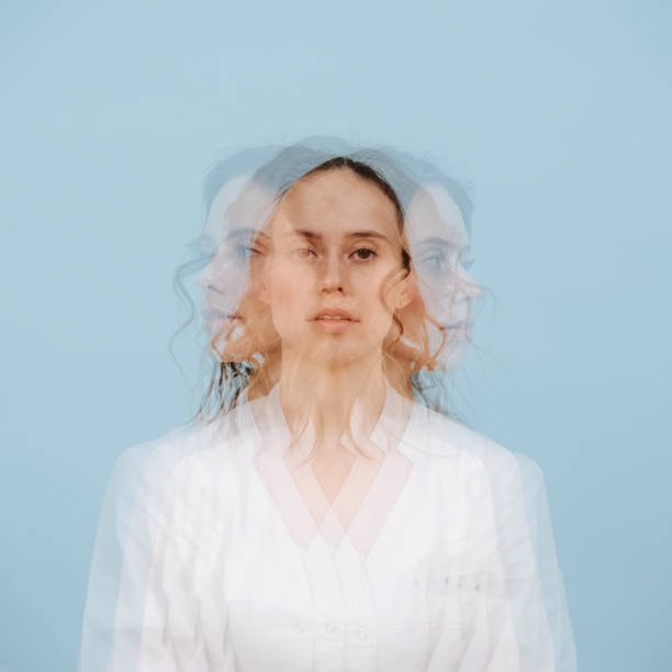 Calm woman. Triple exposure portrait. She's facing three different directions stock photo