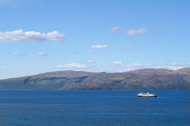 A Calmac ferry passing the Isle of Mull stock photo