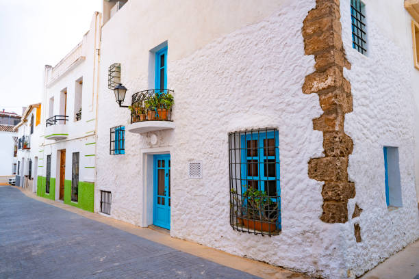Calpe Calp Mediterranean white facades old town in Alicante Spain Calpe Calp Mediterranean white facades old town in Alicante of Spain calpe stock pictures, royalty-free photos & images
