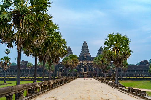 Cambodia. Siem Reap Province. The entrance of Angkor Wat (Temple City). A Buddhist and temple complex in Cambodia and the largest religious monument in the world