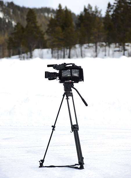 Camera on snow stock photo