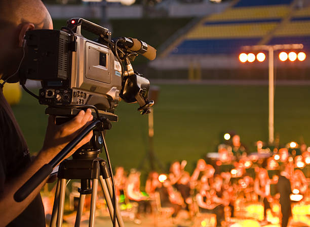cameraman filmagens - estádio e camera - fotografias e filmes do acervo