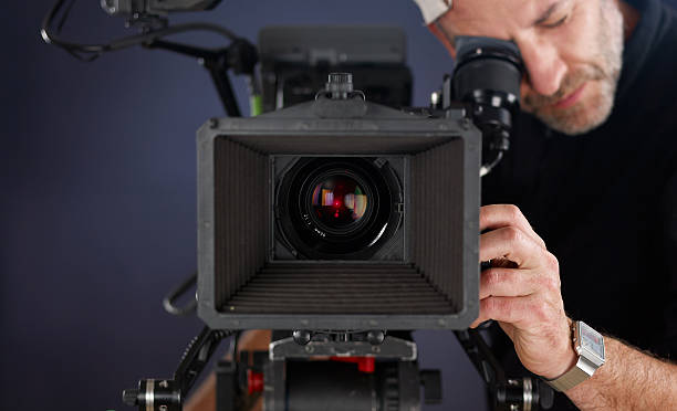 cameraman working with a cinema camera stock photo
