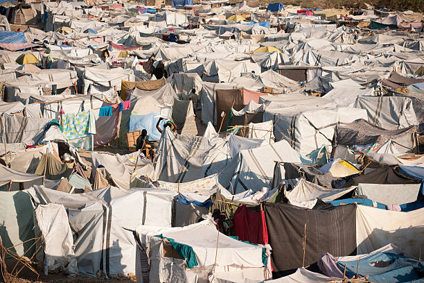 idp camp in haiti - migrants stok fotoğraflar ve resimler