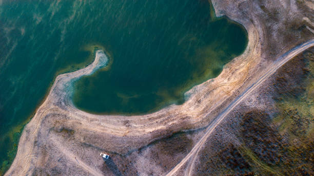 Camper at the Reservoir from Montargil view from above Ponte de Sor Alentejo stock photo