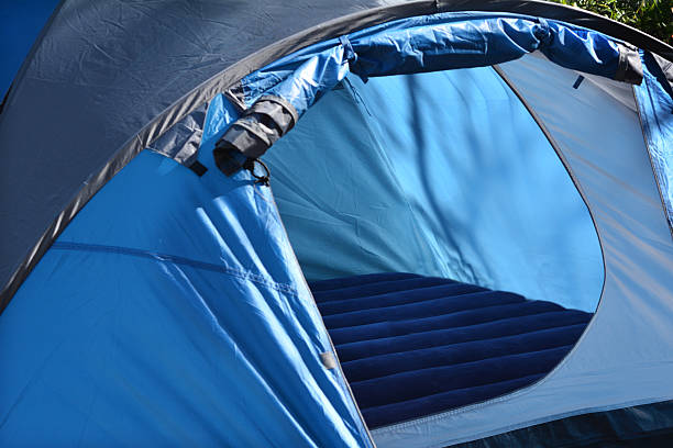 Camping - Tent Empty tent set up outdoor in the nature. concept photo of travel outdoor. inflatable raft stock pictures, royalty-free photos & images