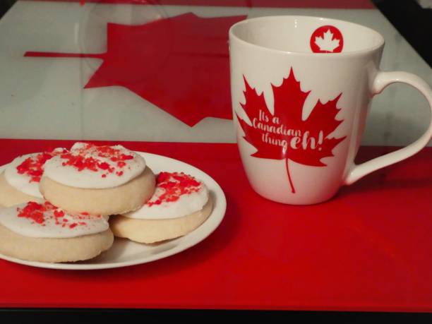 Canada Day Mug, Red and White Cookies,  Canadian Flag Table stock photo